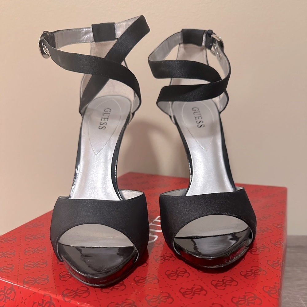 Guess brand black stiletto heels with ankle strap ties and gem stone clasp